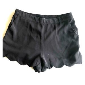 Graphite gray shorts with curvy hemline